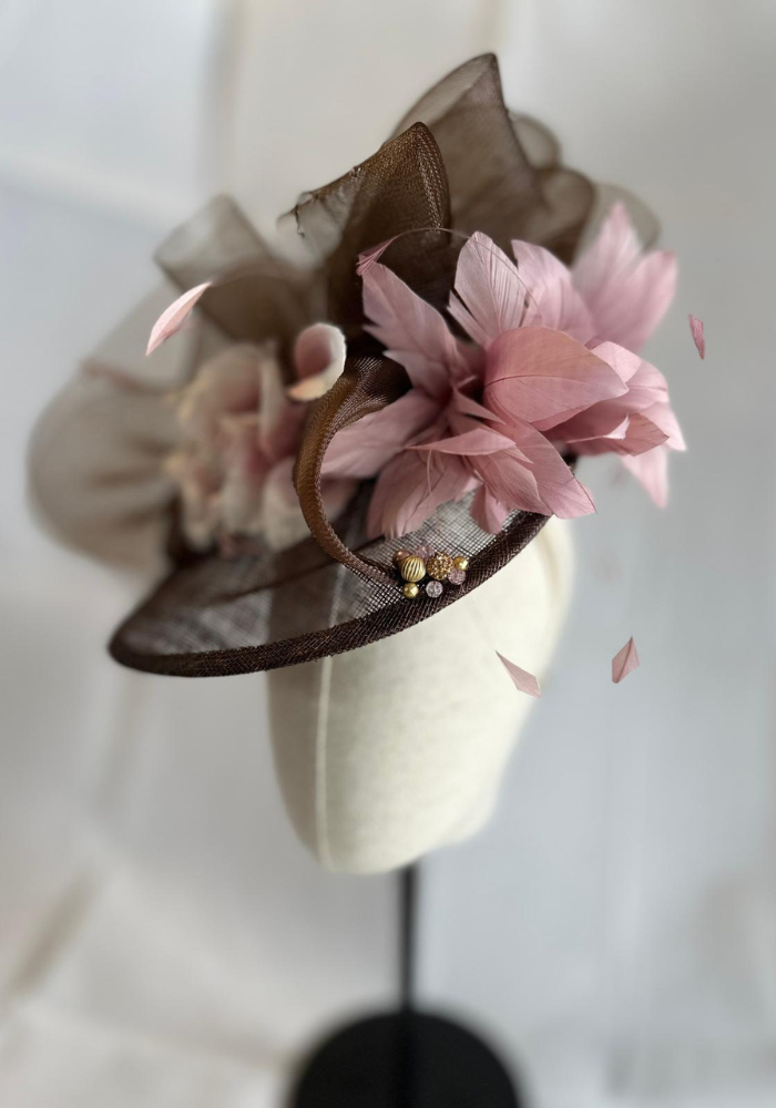 Brown Saucer Base Hatinator With Dusky Pink Flower & Feather Mount