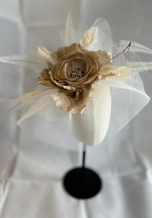 Ivory Crin Base Hatinator With A Beige Flower Detail