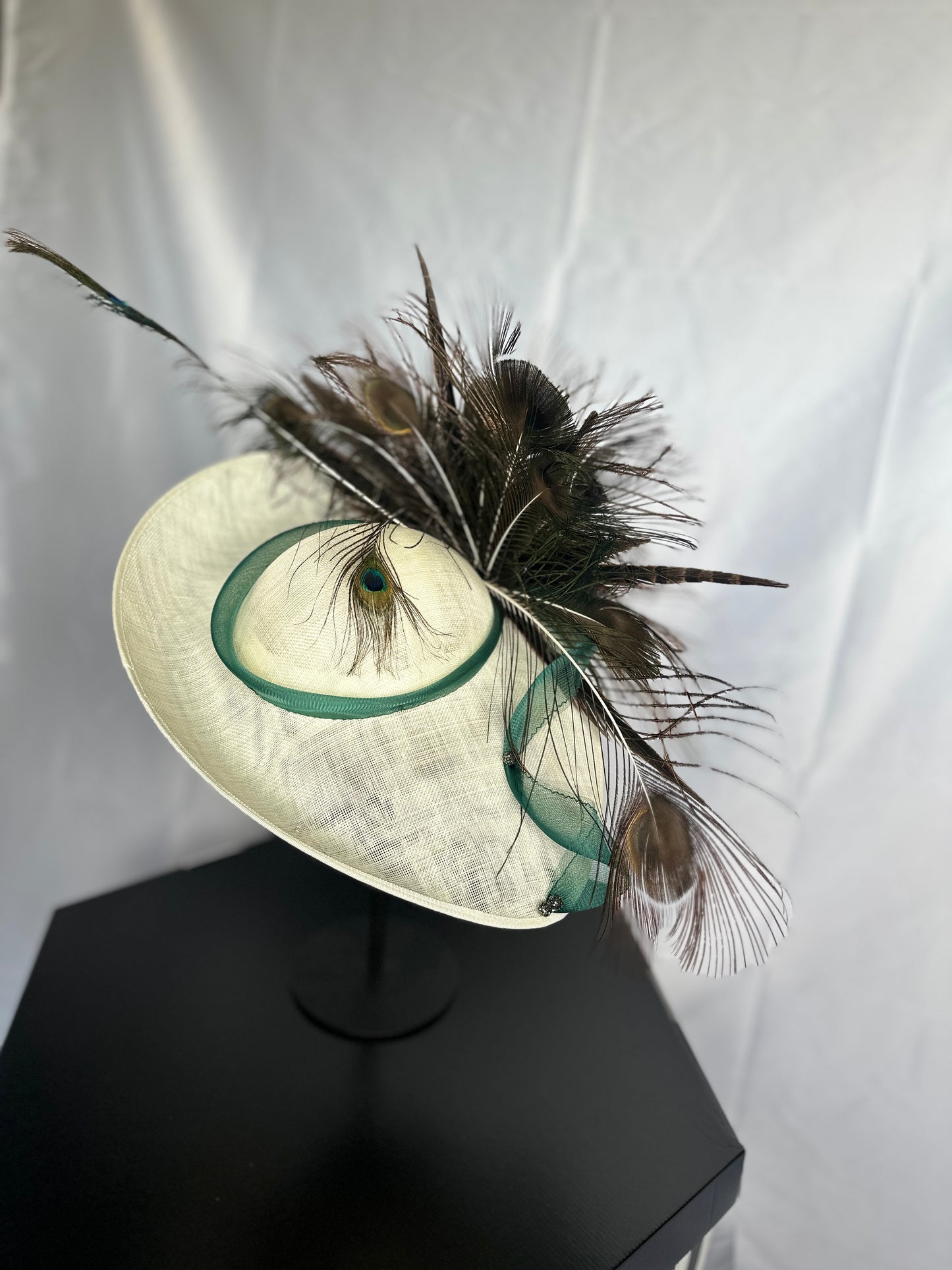 Ivory saucer with Peacock feathers